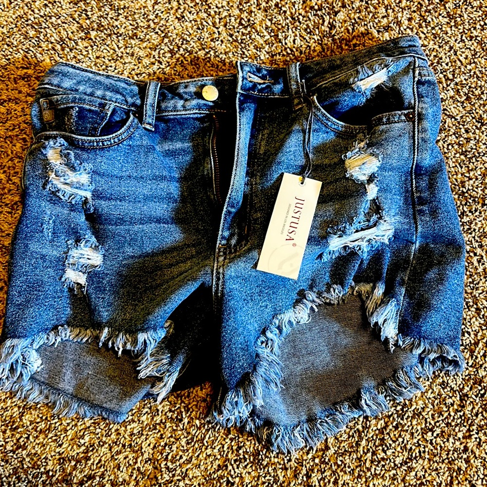 Distressed jean shorts NWT. Size large.